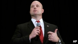 FILE - Matt Whitaker, then an Iowa Senate candidate, speaks during the Iowa Republican Party's annual Lincoln Day dinner in Cedar Rapids, Iowa, April 11, 2014.