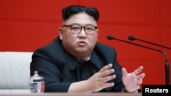 FILE - North Korean leader Kim Jong Un takes part in the 4th Plenary Meeting of the 7th Central Committee of the Workers' Party of Korea in Pyongyang, April 10, 2019. 