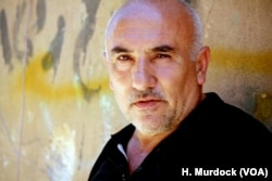 After losing five family members in an airstrike, Jamil Mohammad Ahmed returns to Old Mosul to try to bury his dead, June 25, 2017.