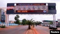 A few cars are pictured on a road, as authorities try to limit the spread of the coronavirus disease (COVID-19) in Abuja, Nigeria, March 30, 2020. 