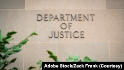 资料照片：美国司法部字样。