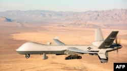 FILE - This handout photo courtesy of the U.S. Air Force, obtained on Nov. 7, 2020, shows an MQ-9 Reaper drone.