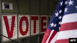 Signage is seen at an early voting center in Minneapolis, Minnesota, Sept. 23, 2016.