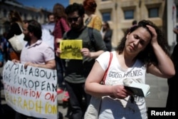 Leyla Mustafayeva, wife of Azerbaijani journalist Efqan Mukhtarli attends a rally in support of her husband in Tbilisi, Georgia, May 31, 2017.