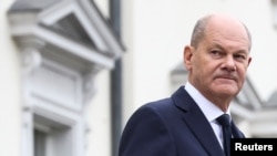 FILE - German Chancellor Olaf Scholz leaves the Bellevue Palace in Berlin, Germany, Nov. 7, 2024. A German government spokesperson said Scholz spoke via telephone with Russian President Vladimir Putin on Friday.