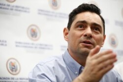 Carlos Vecchio, a government opponent who the U.S. recognizes as Venezuela's ambassador, speaks during a news conference in Miami, June 11, 2019.