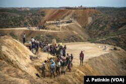 Workers flatten hillsides to make space for Rohingya refugees to move to higher ground to escape the oncoming rains in Bangladeshi refugee camps.