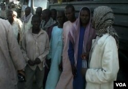 Nigerian refugees are seen at a gathering point before being repatriated to Nigeria, in Fotokol, Cameroon, April 19, 2017. (M.E. Kindzeka/VOA)