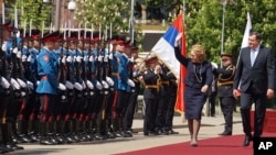Valentina Matviyenko, speaker of the Federation Council, Russian parliament's upper chamber, center, reviews a guard of honour with Milorad Dodik, President of the Republic of Srpska in the Bosnian town of Banja Luka, April 24, 2018.