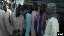 FILE - Nigerian refugees are seen at a gathering point before being repatriated to Nigeria, in Fotokol, Cameroon, April 19, 2017. (M.E. Kindzeka/VOA)