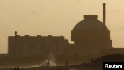 FILE - Police patrol on a beach near Kudankulam nuclear power plant project in the southern Indian state of Tamil Nadu, September 12, 2012.