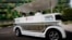 FILE - People ride on a driverless electric vehicle at the Nanyang Technological University (NTU) in Singapore.