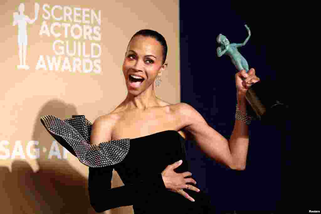 Zoe Saldana poses with the award for Best Performance by a Female Actor in a Supporting Role for "Emilia Perez" at the 31st Screen Actors Guild Awards, in Los Angeles, California, Feb. 23, 2025.