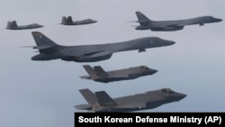 FILE - In this photo provided by South Korean Defense Ministry, aircraft from the United States and South Korea fly during a joint air drill in South Korea, Jan. 1, 2023. North Korea has since called on the United Nations to demand an end to the nations' combined military drills.