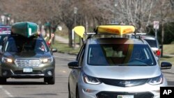 FILE - Supporters of the Campaign to Save the Boundary Waters rally to protect the Boundary Waters Canoe Area on April 22, 2020, in St. Paul, Minnesota. The Biden administration moved Thursday to protect the pristine area in northeastern Minnesota from future mining.