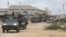 FILE - Members of the Somali National Army SNA move to their barracks in Mogadishu, Somalia, May 7, 2021.