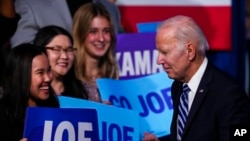 President Joe Biden walks off the stage after speaking at the Democratic National Committee winter meeting, Feb. 3, 2023, in Philadelphia.