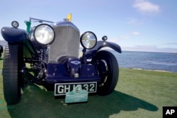 FILE - A classic Bentley at the Pebble Beach Concours d'Elegance in 2019. (Tony Avelar /AP Images for Flexjet)