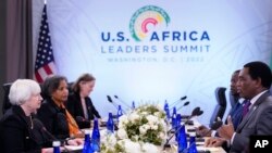 FILE - U.S. Treasury Secretary Janet Yellen meets with Zambia's President Hakainde Hichilema during the U.S. Africa Leaders Summit in Washington, Dec. 15, 2022.