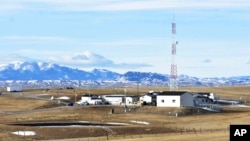 A U.S. Air Force installation surrounded by farmland is pictured on Feb. 7, 2023, near Harlowton, Mont. Lawmakers across the nation are weighing further restrictions on foreign ownership of U.S. farmland. (Matthew Brown/AP)