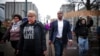 Memphis City Councilman JB Smiley Jr., center, marches with local activists demanding justice for Tyre Nichols, who died after being beaten by Memphis police during a traffic stop, in Memphis, Tenn., on Jan. 28, 2023. 