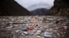 Waste floats in the Drina River near Visegrad, Bosnia, Jan. 20, 2023.