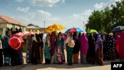 FILE - Women queue to vote for Somaliland's elections at a polling station in Gabiley on May 31, 2021.