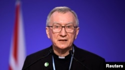 FILE - Vatican Secretary of State Cardinal Pietro Parolin in Glasgow, Scotland, Britain, Nov. 2, 2021.