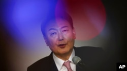 South Korea's president-elect Yoon Suk-yeol speaks during a news conference at the National Assembly in Seoul, South Korea, March 10, 2022.