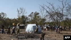 FILE - Burkina Faso refugees are seen at a shelter in Tougbo on Jan. 22, 2022. Thousands of people who fled to Ivory Coast from jihadist attacks in Burkina Faso are living in limbo.