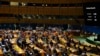 Screens display the results of a vote on a resolution regarding the war in Ukraine at U.N. headquarters, March 24, 2022.
