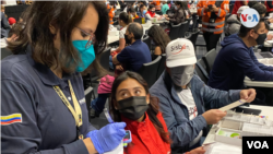 La meta del gobierno colombiano es entregar 1,8 millones Permisos de Protección Temporal (PPT) antes de que concluya el mandato del presidente Iván Duque. [Foto: Jairo Chacón, VOA]