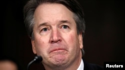 FILE - U.S. Supreme Court nominee Brett Kavanaugh testifies before a Senate Judiciary Committee confirmation hearing on Capitol Hill in Washington, Sept. 27, 2018.
