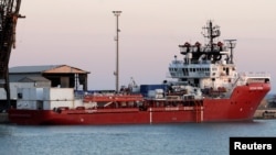 FILE - Rescue ship 'Ocean Viking' arrives with rescued migrants in Porto Empedocle in Sicily, Italy, July 6, 2020. 