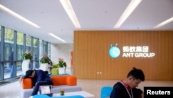FILE - A logo of Ant Group is pictured at the headquarters of Ant Group, an affiliate of Alibaba, in Hangzhou, Zhejiang province, China, Oct. 29, 2020. 
