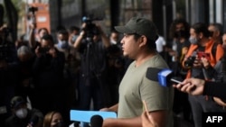 FILE - Jonathan Cuevas speaks during a protest against the slaying of journalist Fredid Roman, in Mexico City, on Aug. 24, 2022. This year has been the bloodiest to date for Mexican journalists. The death of the latest victim, Pedro Pablo Kamul, occurred Nov. 21.