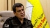 FILE - Syrian-Kurdish commander Mazloum Abdi, of the U.S.-backed Syrian Democratic Forces, speaks in Hassakeh, Syria, Nov. 26, 2022. On Monday, he congratulated Donald Trump in his reelection as president of the United States.