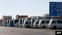 Jordanian bus drivers strike to protest rising fuel prices, in the province of Maan, Jordan, Dec. 16, 2022.