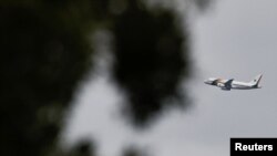 The plane of Brazilian President Jair Bolsonaro flies near Alvorada Palace in Brasilia, Brazil, Dec. 30, 2022.
