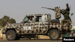 FILE - Security forces are seen on patrol in Nigeria's Zamfara state, March 3, 2021