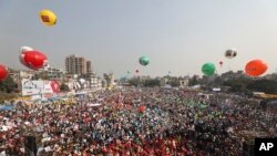 Bangladesh National Party (BNP) supporters shout slogans during a rally in Dhaka, Bangladesh, Saturday, Dec. 10, 2022. 