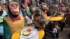 Monkeys in Central Thailand City Mark Their Day With Feast 