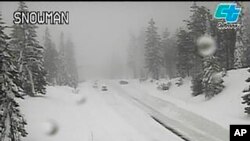 This image from a Caltrans traffic camera shows snow on the road known as California SR-89 Snowman in Shasta-Trinity National Forest, California, on Dec. 10, 2022. 