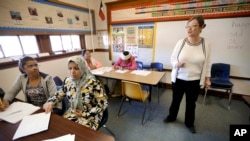 FILE - An English as a second language class in Abilene, Texas, on Dec. 16, 2014, included students from the Dominican Republic, Bhutan and Iraq. 