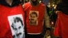 FILE - People wearing jerseys with the face of Abdullah Ocalan, leader of the Kurdistan Workers' Party, are pictured during an event in Paris, Dec. 24, 2022.