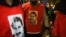 FILE - People wearing jerseys with the face of Abdullah Ocalan, leader of the Kurdistan Workers' Party, are pictured during an event in Paris, Dec. 24, 2022.