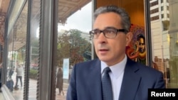 Dennis Miralis, lawyer for former U.S. military pilot Daniel Duggan, who was arrested in Australia on undisclosed charges at the request of the United States, speaks to media outside a court in Sydney, Australia, November 4, 2022, in this screen grab taken from a video.