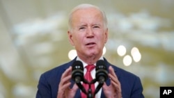 US President Joe Biden speaks in the East Room of the White House, Dec. 22, 2022, in Washington.