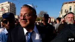 FILE - Itamar Ben-Gvir, Israel's new Minister of National Security and leader of the far-right Otzma Yehudit (Jewish Power) party, arrives to visit Jerusalem's Mahane Yehuda market on Dec. 30, 2022. 