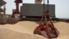 FILE - Wheat grain from Ukraine is seen on the docks in Djibouti, Aug. 30, 2022. Malawi is working to harvest its own wheat, to mitigate the impact of the Russia-Ukraine conflict on grain imports to Africa. (Hugh Rutherford/World Food Program/Handout via Reuters)